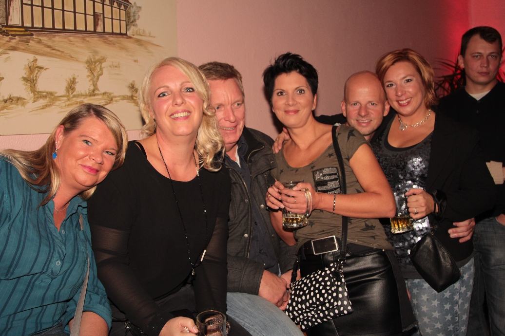 Gste posieren fr ein Foto